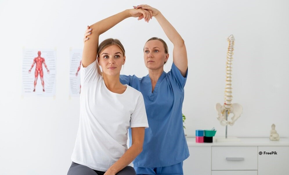 Physiotherapist treating patient